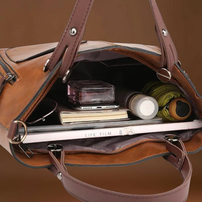 Maria. - Bolsa de couro elegante