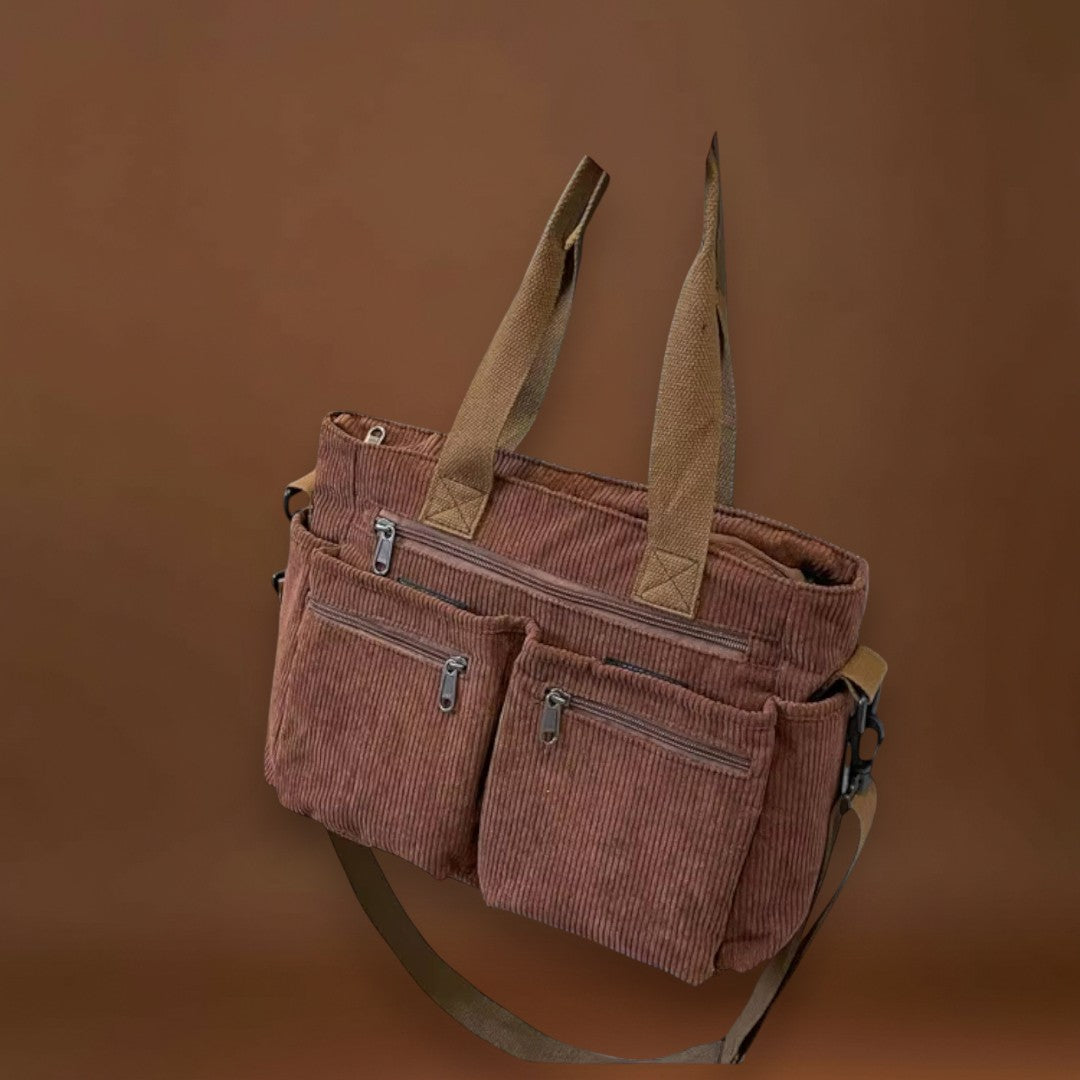 Maria. - Mala com vários bolsos