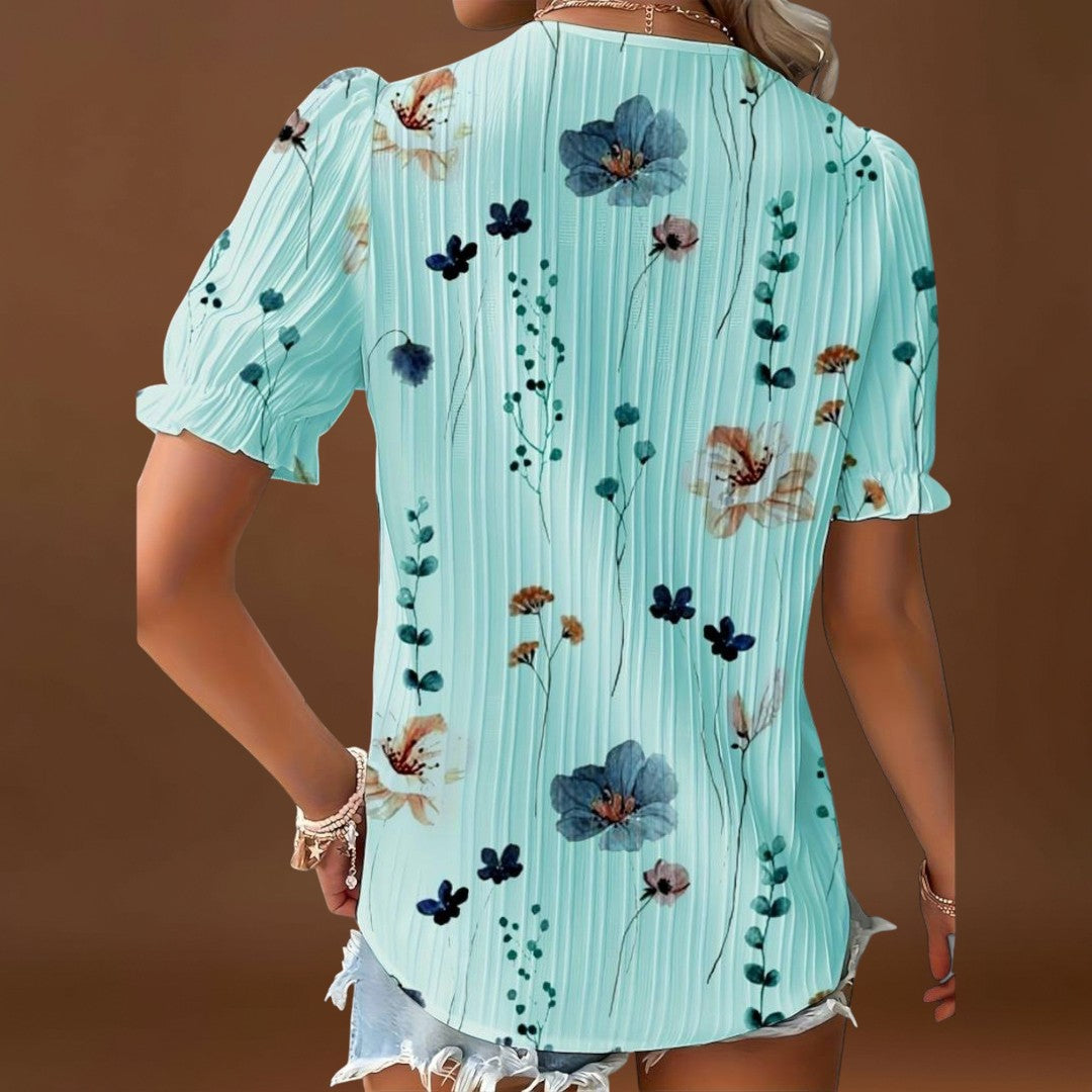 Bruna - Blusa elegante com um decote pontiagudo