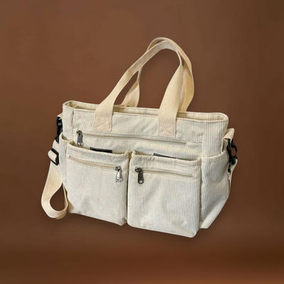 Maria. - Mala com vários bolsos