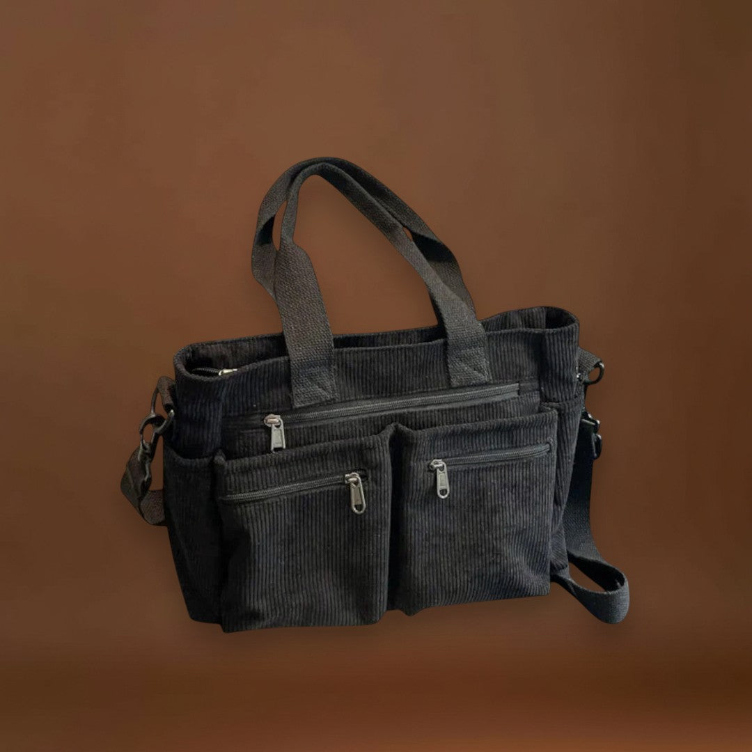 Maria. - Mala com vários bolsos